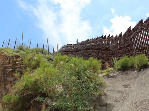 The U.S.-Mexico border wall at Nogales, AZ